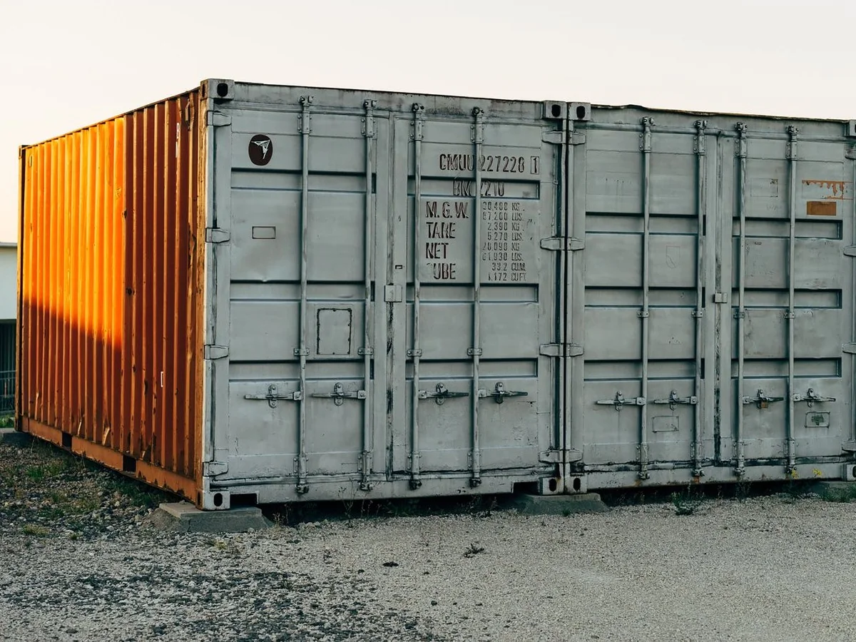 Real standard dry shipping containers photographed from the cargo doors