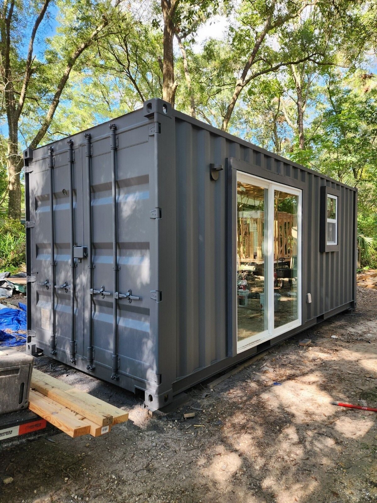 Charcoal Swift Build container workspace with large sliding glass doors